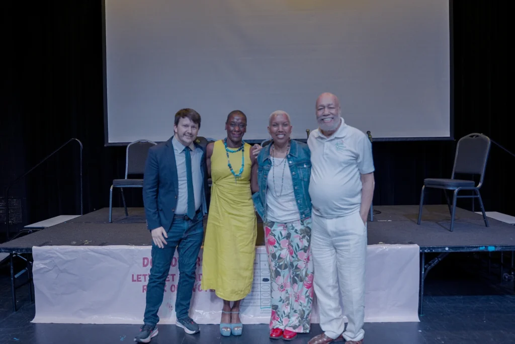 Brian Strege, Kenyatta Smith, Lisa D.T. Rice, and Philip Pannell pose together following the post-screening panel at the Grow Democracy DC community screening, June 5, 2026.